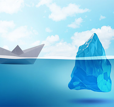 a view of a paper boat floating next to an iceberg