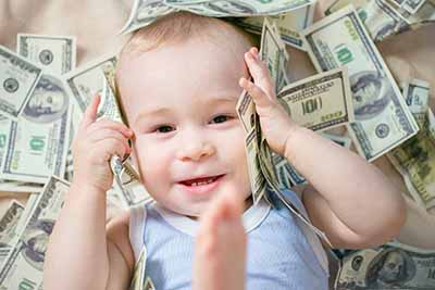 Baby playing with cash