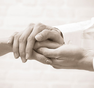 Black and white image of holding hands