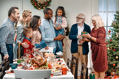 Happy mixed race family celebrates the holidays