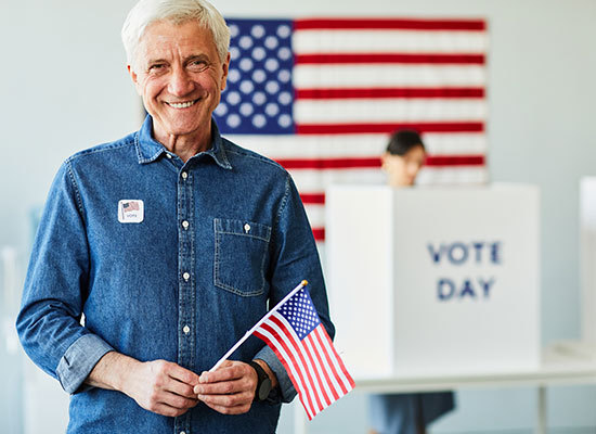 older gentleman at a voting booth