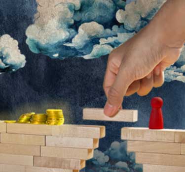 A giant hand carefully placing a wooden block to bridge a gap, symbolizing strategic steps in bridging financial solutions and overcoming economic challenges.