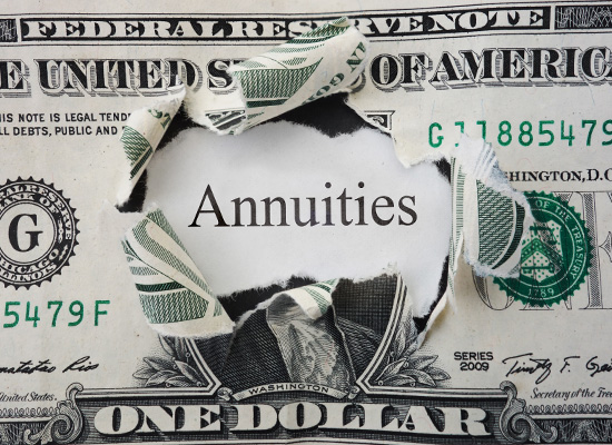 A torn dollar bill revealing the word 'Annuities,' highlighting their role in income planning and withdrawal strategies for retirement.