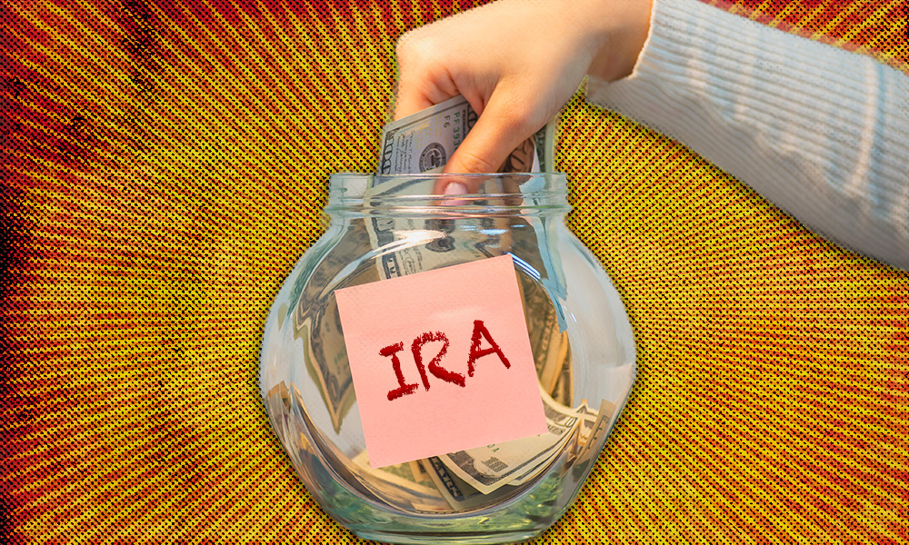 A conceptual image of a hand withdrawing cash from a glass jar labeled 'IRA'