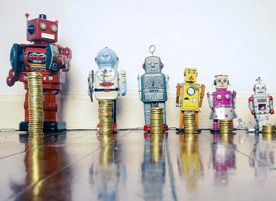 A picture of six robots standing in front of a stack of coins.