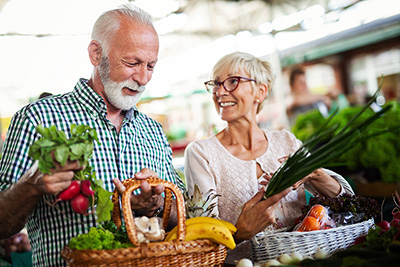 Senior couple shopping at Farmer's market