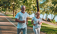 Senior couple jogging together