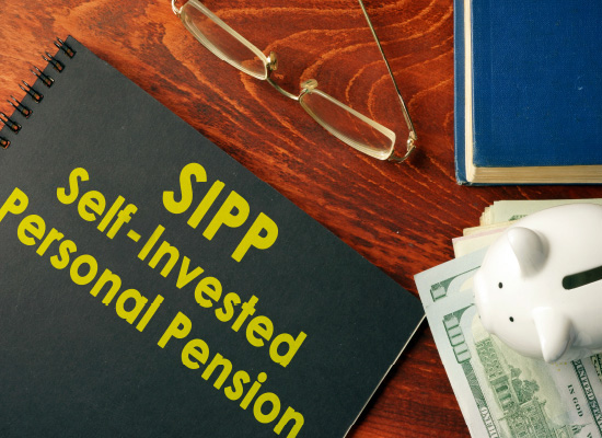 book showing the text 'SIPP self-invested personal pension'