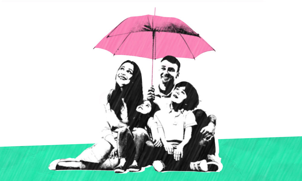 A stylized illustration of a smiling family sitting together on a green surface, shielded by a pink umbrella held by the father. The mother, father, and two children all appear happy and close-knit under the umbrella—a perfect representation of life insurance at work.