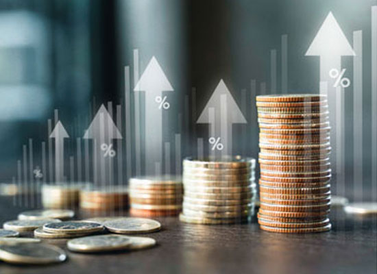 Stacks of coins symbolize the financial growth and tax benefits of a multi-beneficiary Charitable Remainder Trust (CRT)