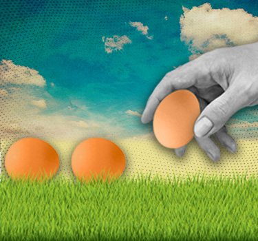 A surreal image depicting a giant grayscale human hand placing a brown egg on a vibrant, grassy field under a painted sky, with two similar eggs already on the ground.