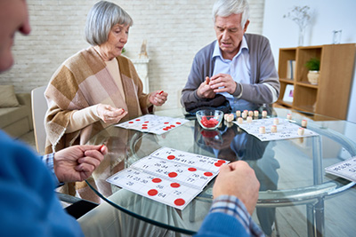Senior friends playing bingo together