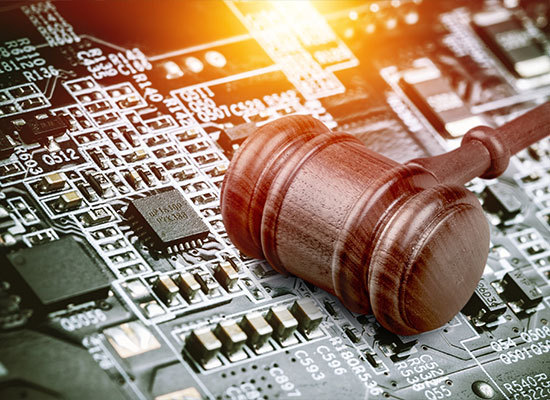 a gavel on top of a circuit board