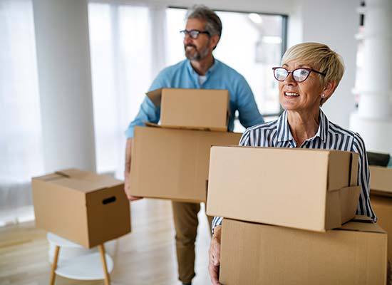 Carrying cardboard boxes during a move