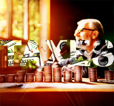 Illustration of tax planning concepts with the word 'TAX' overlaying dollar bills, stacks of coins, and graphs