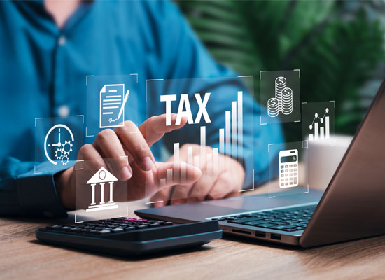 Person using a laptop and calculator with digital icons representing tax strategy, tax brackets, Roth IRA accounts, capital gains, and retirement savings.